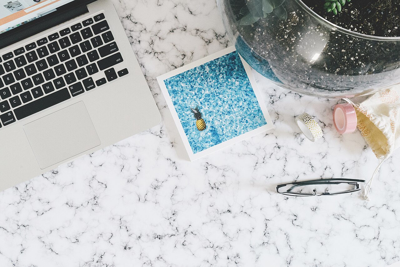 A tidy desk with a laptop used for everyday browsing